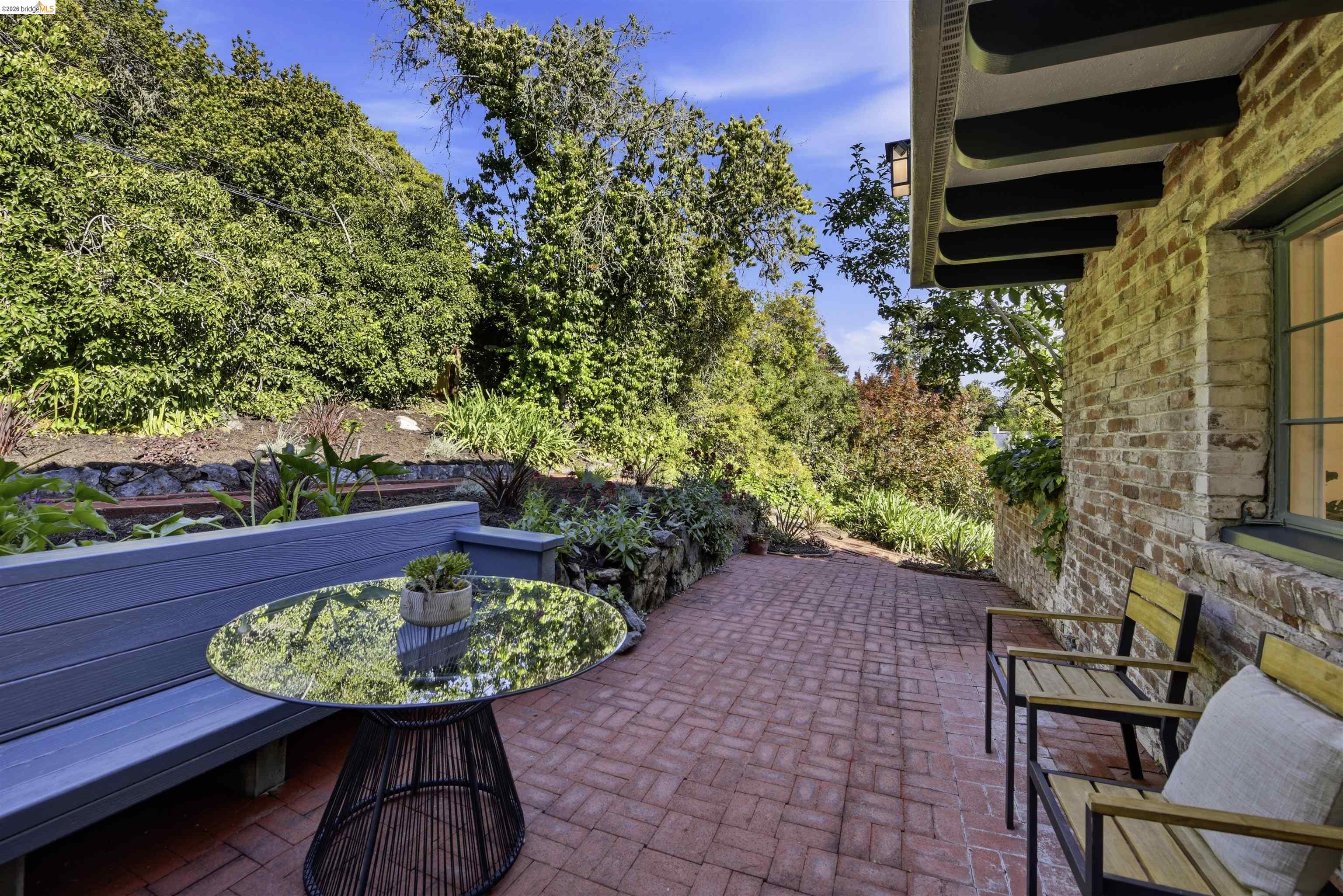 44 Highgate Road Kensington, CA 94707 - Photo 53 of 83 a view of a chairs and table in a patio