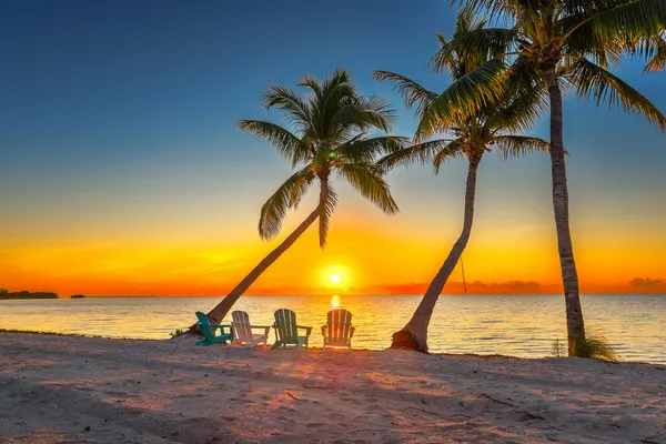 a view of a lake with a house in background