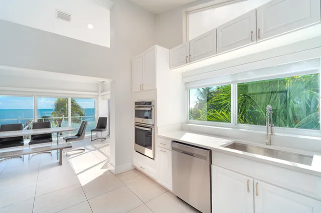 a bedroom with a sink and a mirror