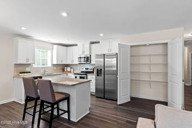 $310,000 | 1316 South Fisher King Drive Southeast, Bolivia, NC 28422