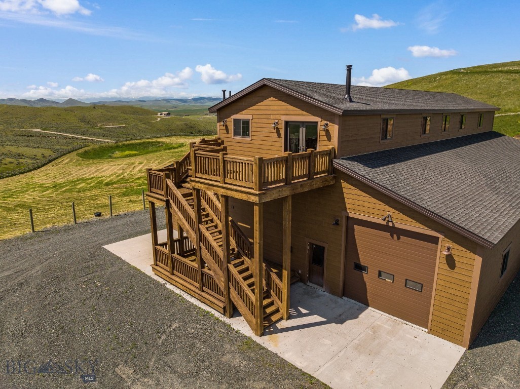 26 Dalesview Three Forks, MT 59752 - Photo 10 of 51 Back deck on Living Quarters with Hot Tub hookup.