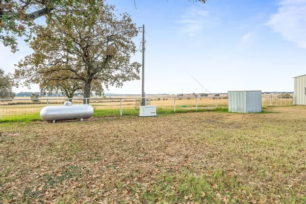 a view of a lake with a big yard