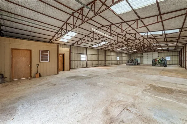 swimming pool view with a lake view