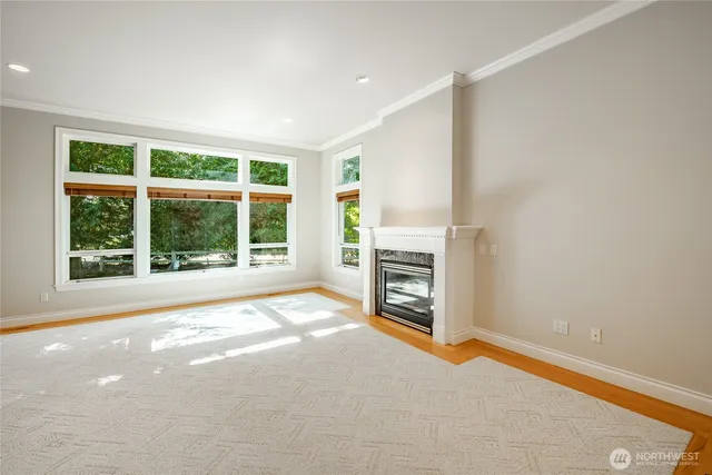 a view of a room with furniture and a window