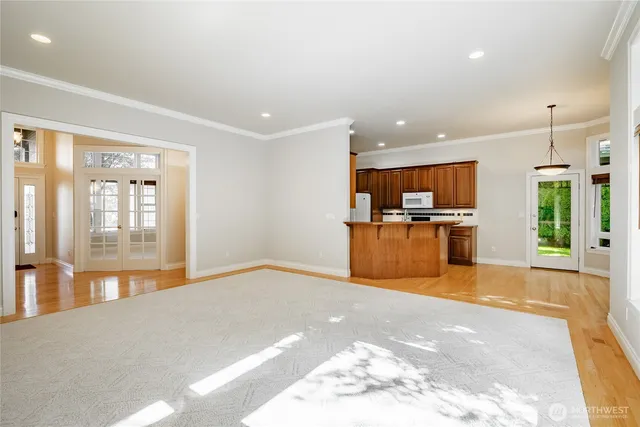 a view of a kitchen with a sink and a stove top oven