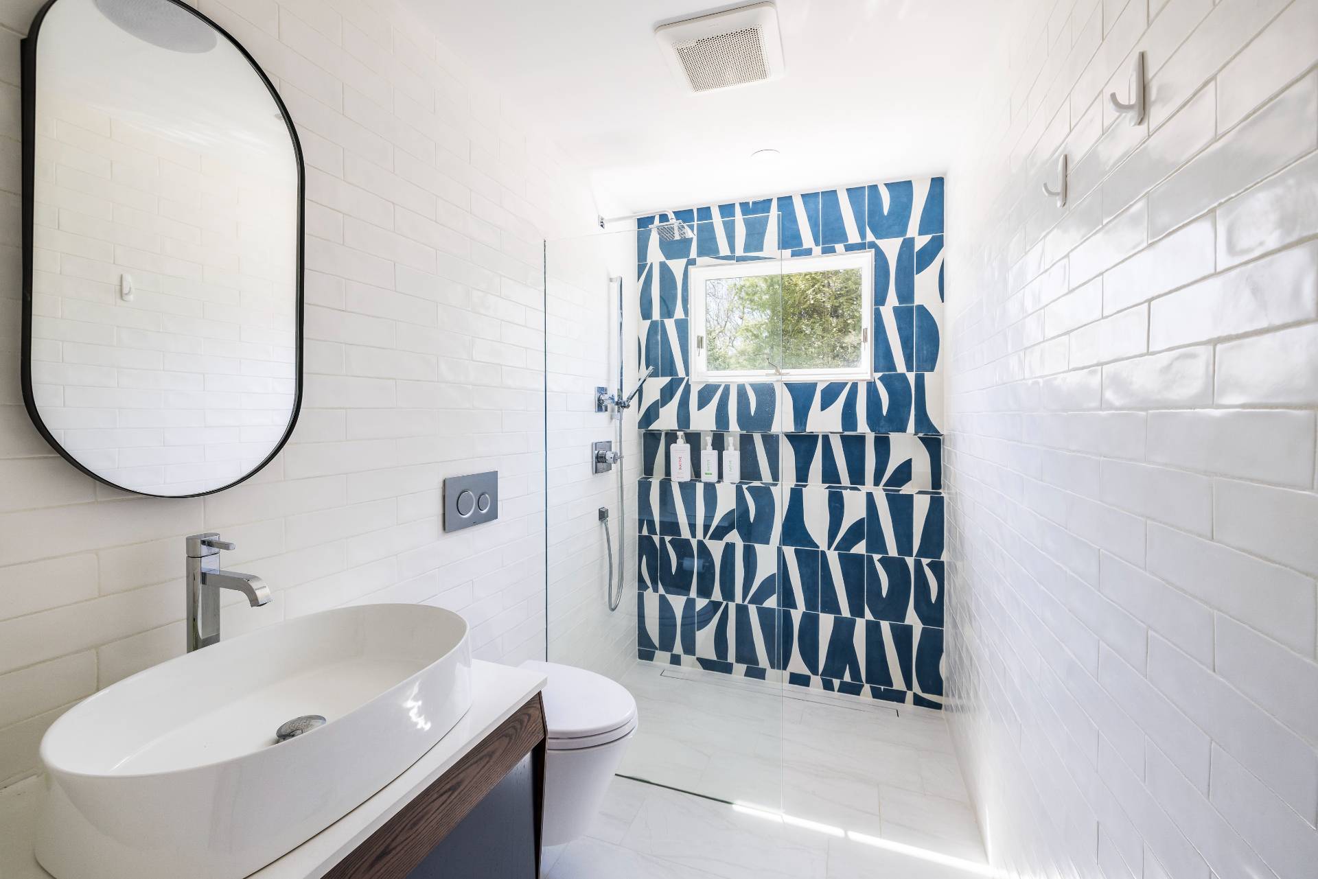 16 Central Avenue East Hampton, NY 11937 - Photo 12 of 16 a bathroom with a sink and a mirror