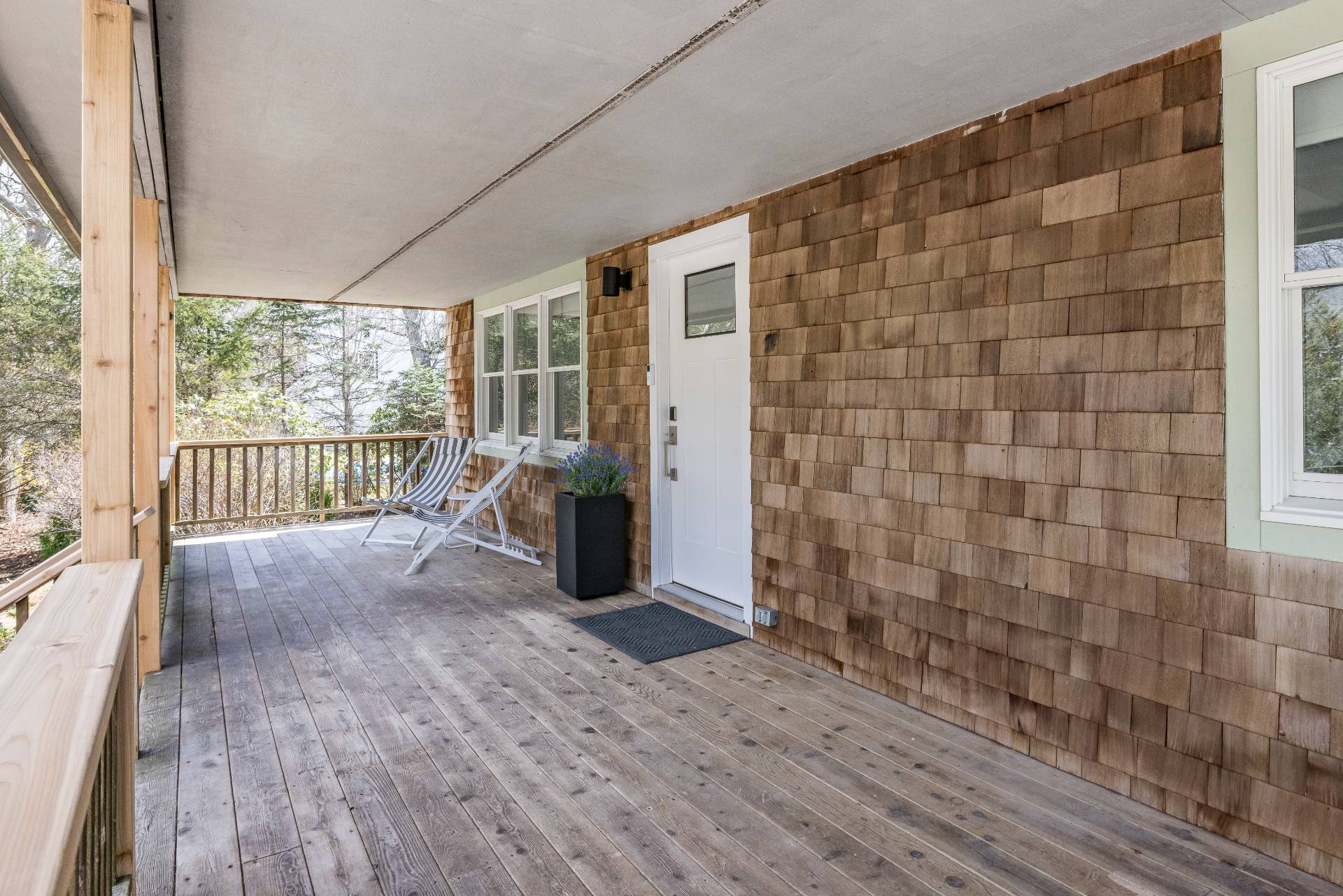 16 Central Avenue East Hampton, NY 11937 - Photo 15 of 16 a view of empty room with wooden floor and fan