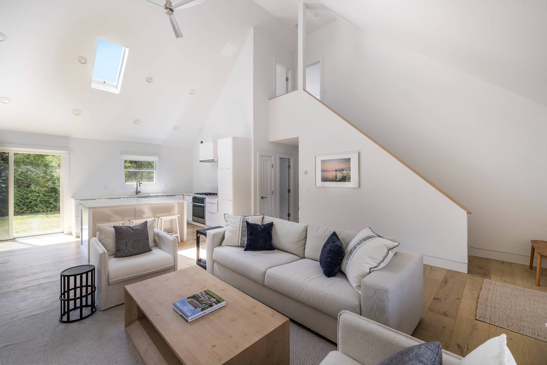 16 Central Avenue East Hampton, NY 11937 - Photo 2 of 16 a living room with furniture and a couch