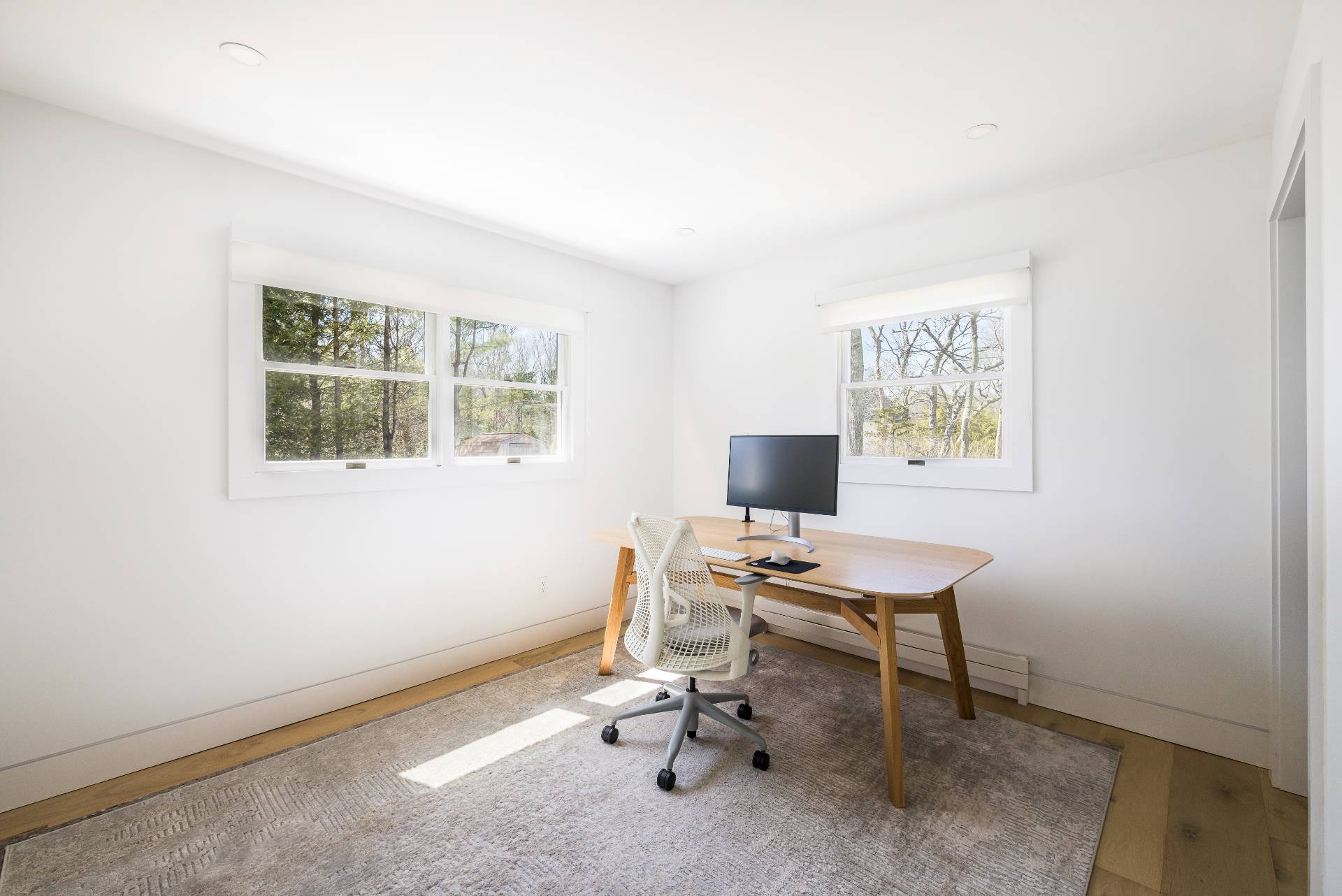 16 Central Avenue East Hampton, NY 11937 - Photo 10 of 16 a view of a workspace with a window