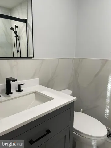 a bathroom with a mirror