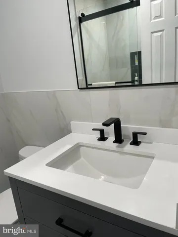 a bathroom with a mirror