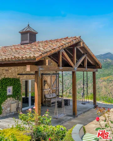 a outdoor living space with furniture