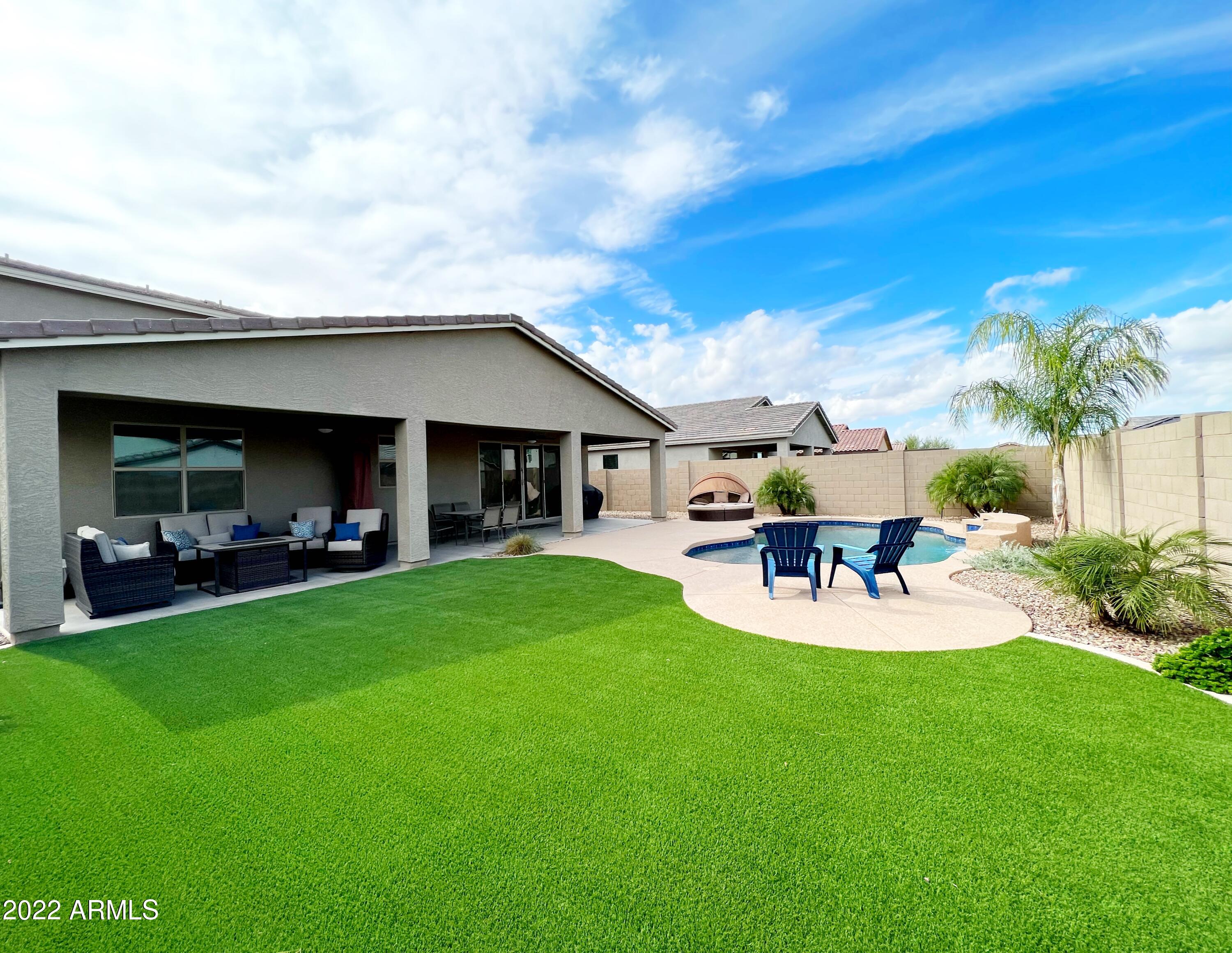 3330 West Fremont Rd. Phoenix, AZ 85041 - Photo 29 of 43 a view of a house with backyard and porch