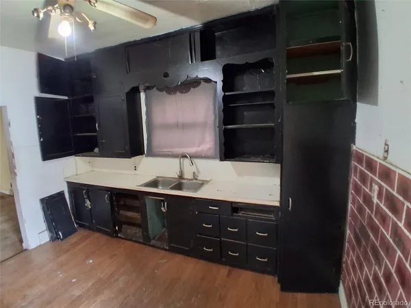 a bathroom with a sink double vanity and a shower