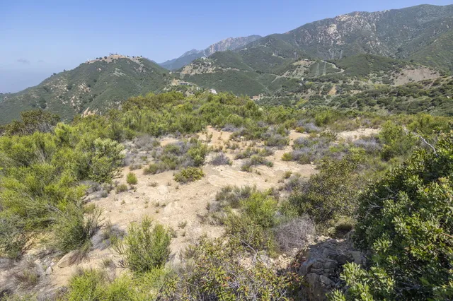 a view of mountain view with mountains in the background