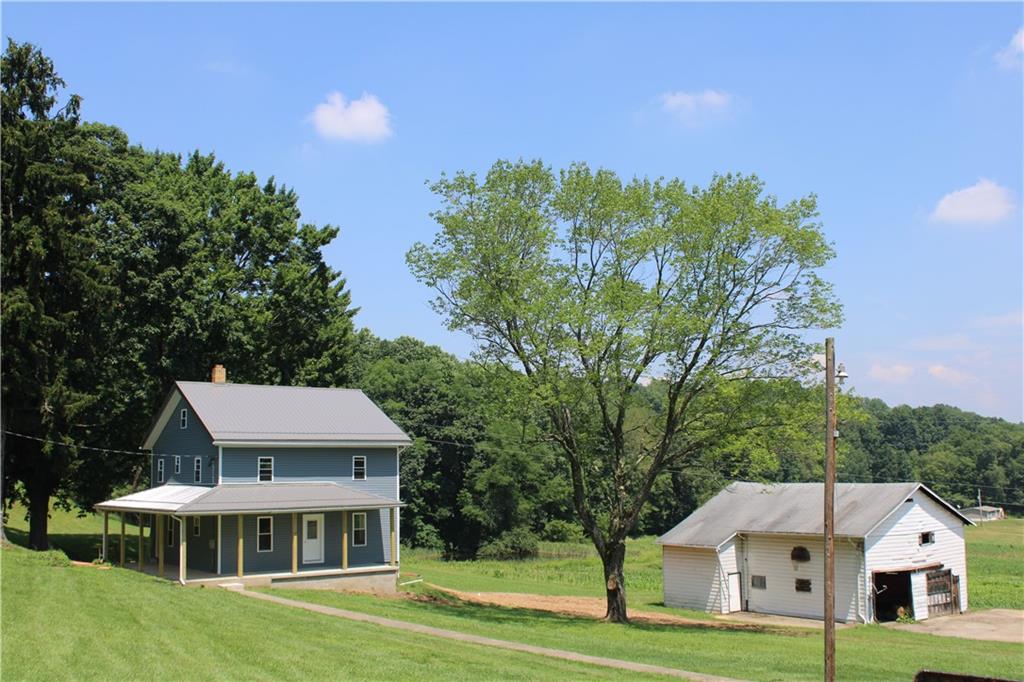 5286 Pollock Road Marion Center, PA 15759 - Photo 1 of 21 a front view of a house with a yard