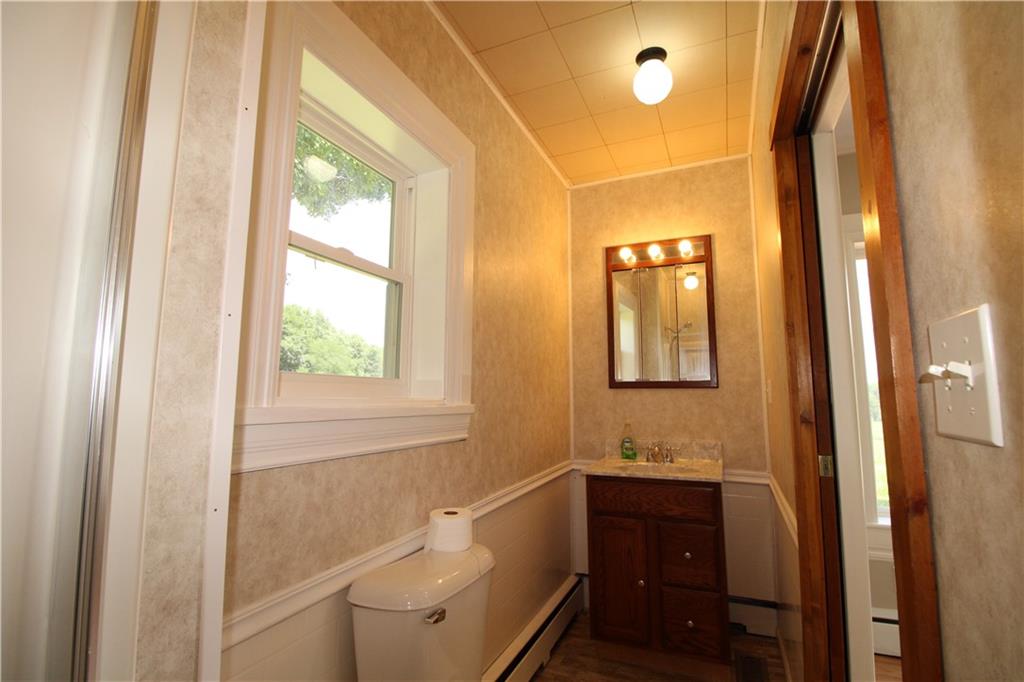 5286 Pollock Road Marion Center, PA 15759 - Photo 13 of 21 a bathroom with a sink a toilet and shower