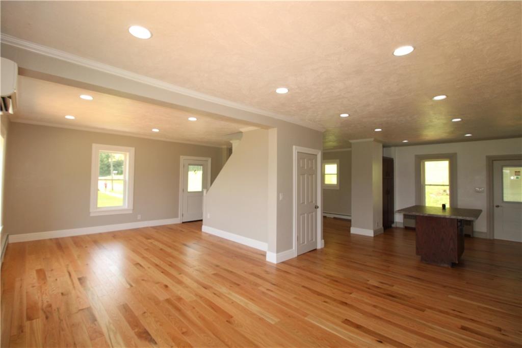 5286 Pollock Road Marion Center, PA 15759 - Photo 10 of 21 a view of an empty room with wooden floor and a window