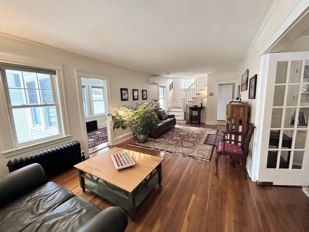 17 Longfellow Road Worcester, MA 01602 - Photo 8 of 19 a living room with furniture and a wooden floor