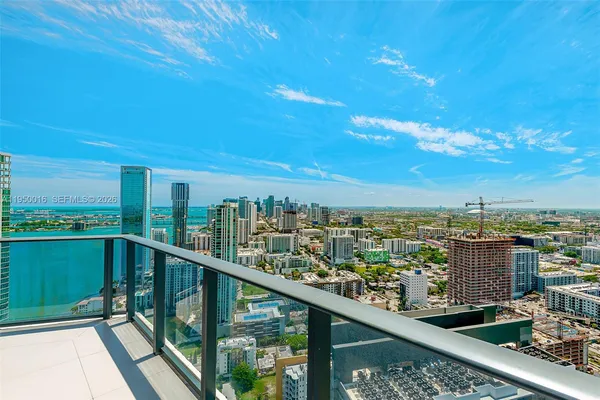 a view of a balcony with city view