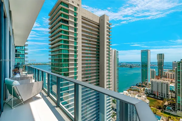 a balcony view with a lake view