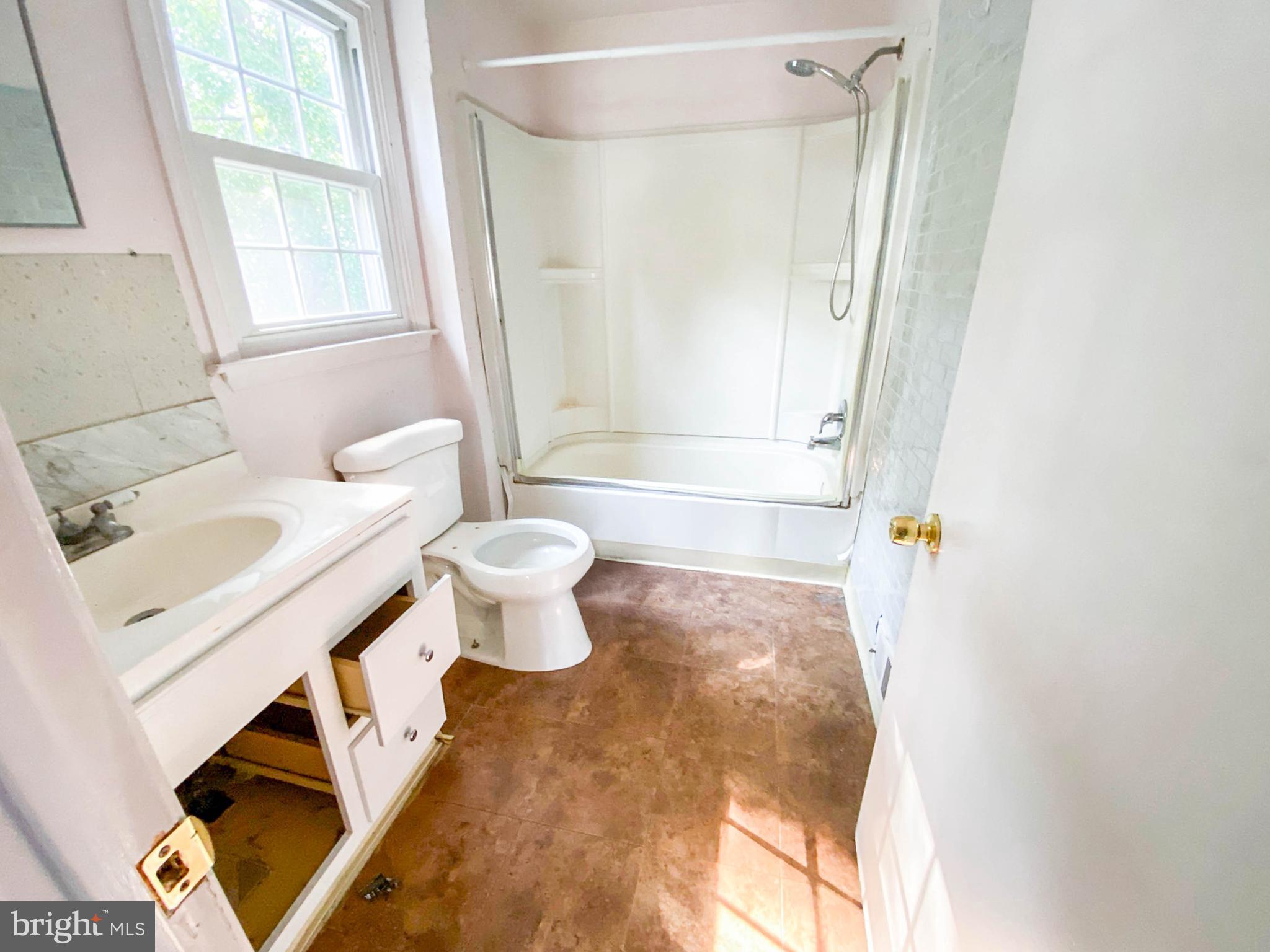 206 Chestnut Avenue Media, PA 19063 - Photo 21 of 33 a bathroom with a sink toilet and shower