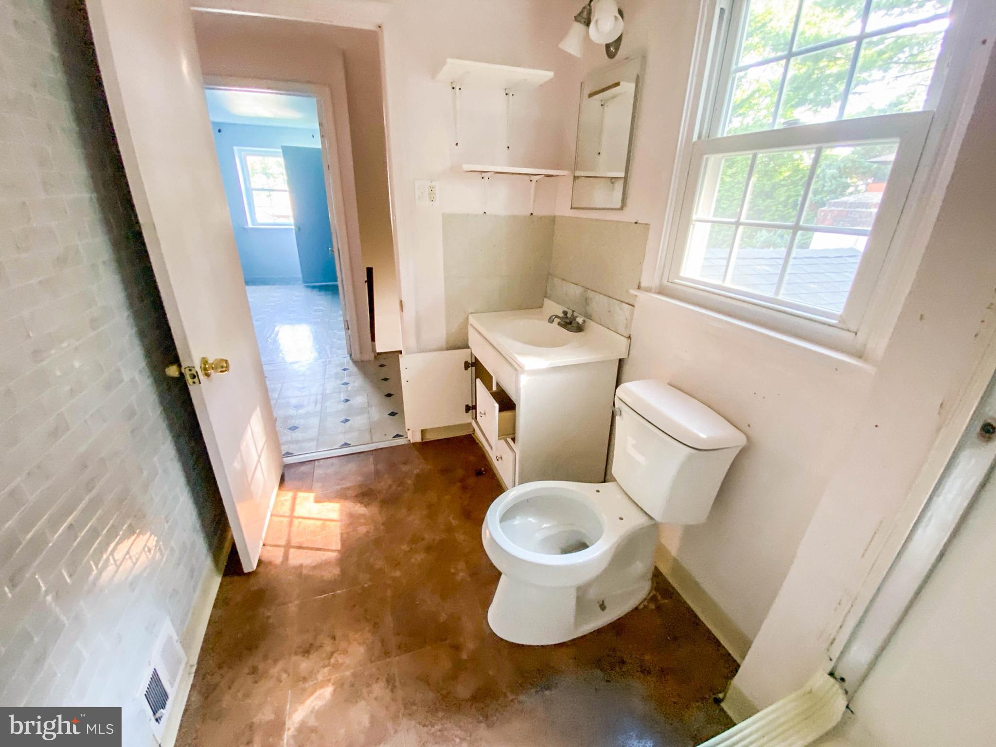 206 Chestnut Avenue Media, PA 19063 - Photo 22 of 33 a white toilet sitting next to a window