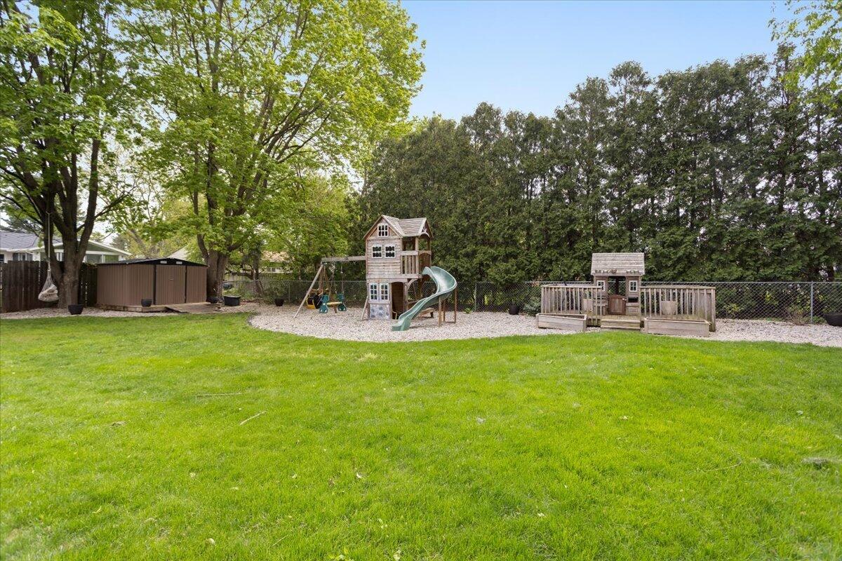 1802 Cedar Tree Drive Jenison, MI 49428 - Photo 40 of 41 playground and playhouse deck
