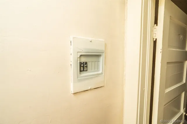 a outdoor living space with furniture and a flat screen tv