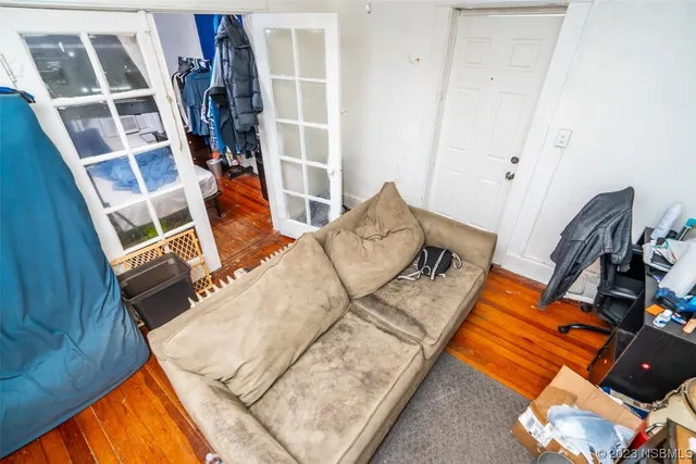 a view of a living room with furniture