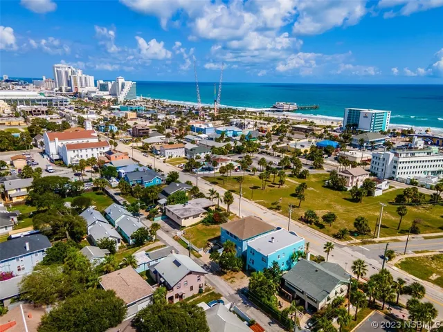 an aerial view of a building with outdoor space
