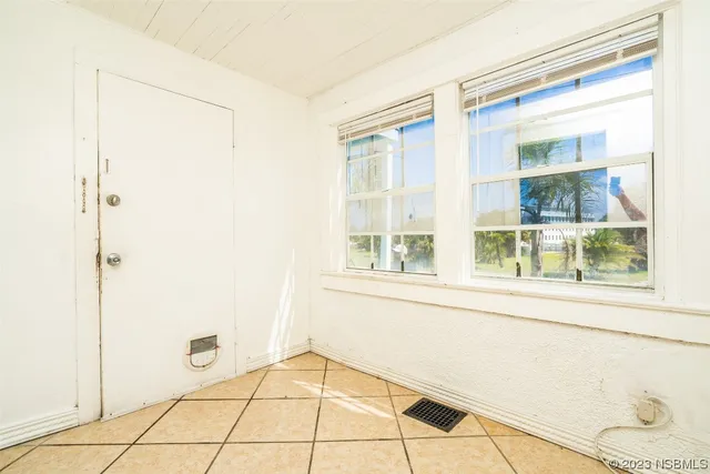 a view of an empty room with window