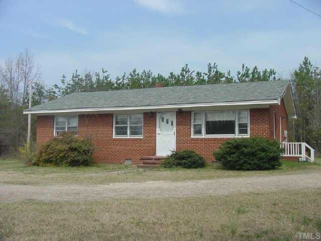 6833 Forestville Road Raleigh, NC 27604 - Photo 1 of 1 front view of house with a yard