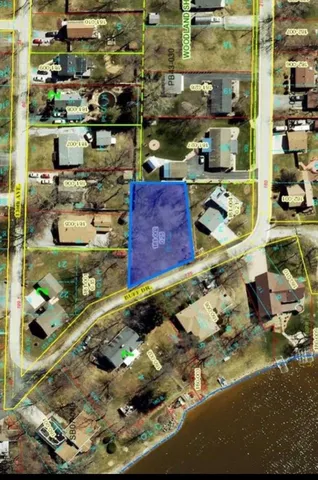 a room with water heater and wooden walls