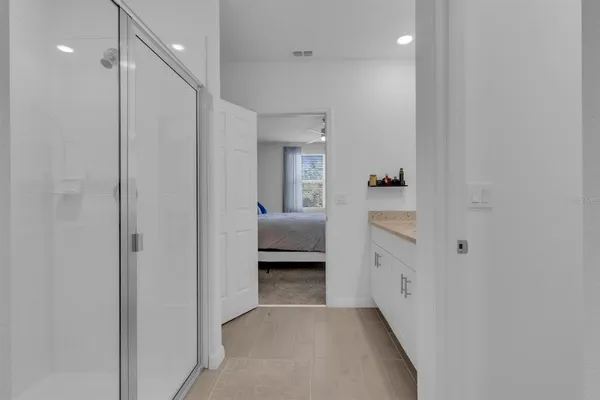 a bathroom with a sink toilet and vanity