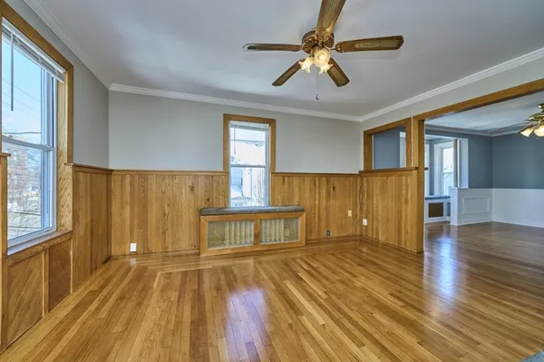 a view of a livingroom with wooden floor
