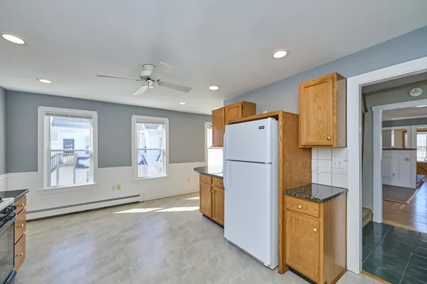 a bathroom with a sink a mirror and a bathtub