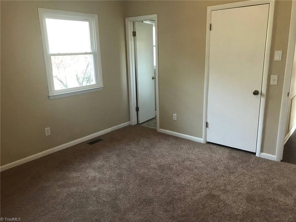1133 Reeves Mill Road Mount Airy, NC 27030 - Photo 15 of 24 Master Bedroom with half bath