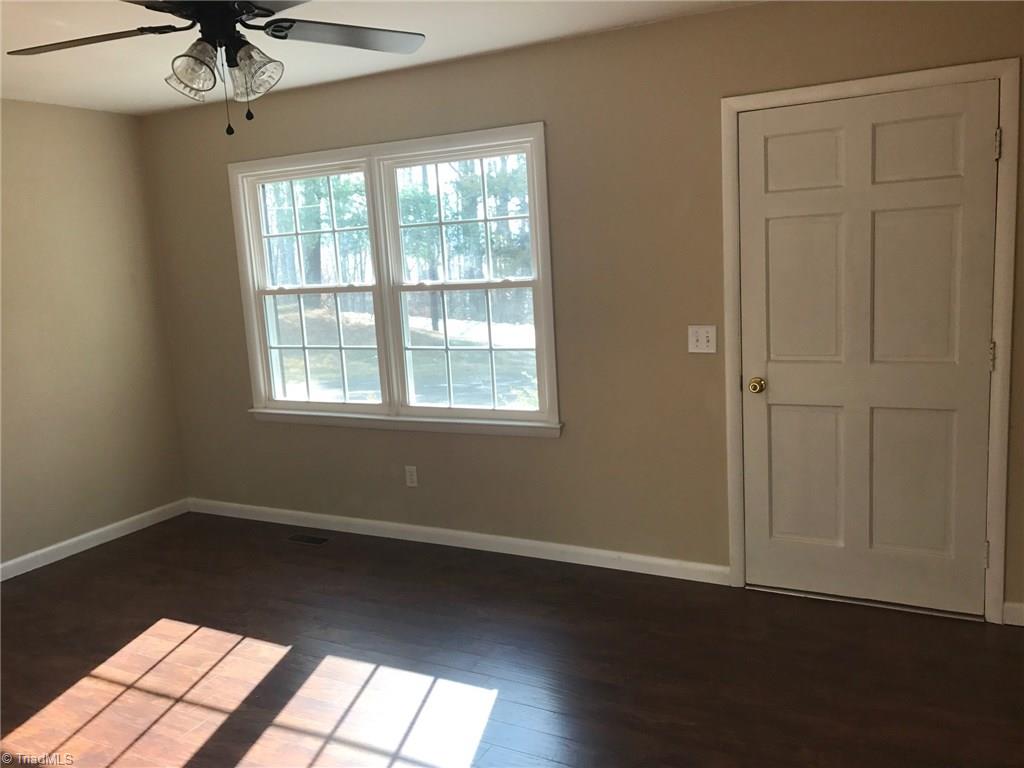 1133 Reeves Mill Road Mount Airy, NC 27030 - Photo 4 of 24 Living Room Area, Front door pictured (Back)