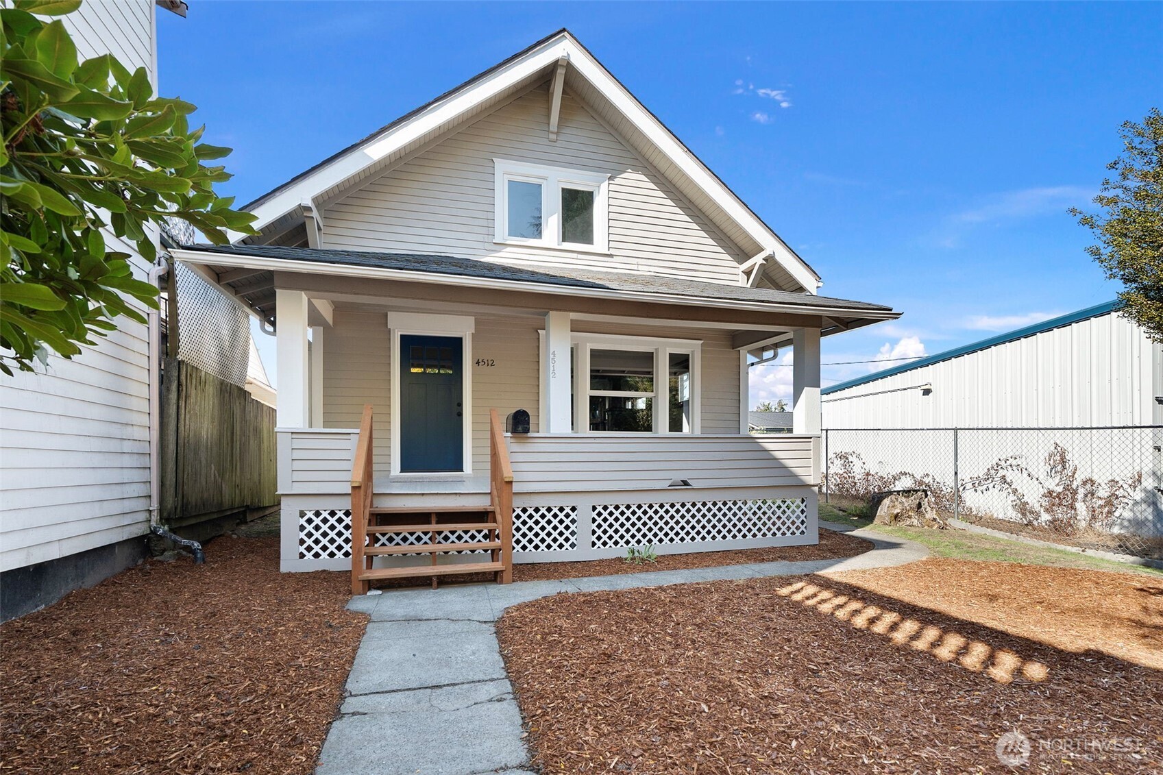 4512 South M Street Tacoma, WA 98418 - Photo 24 of 24 a view of a house with a yard