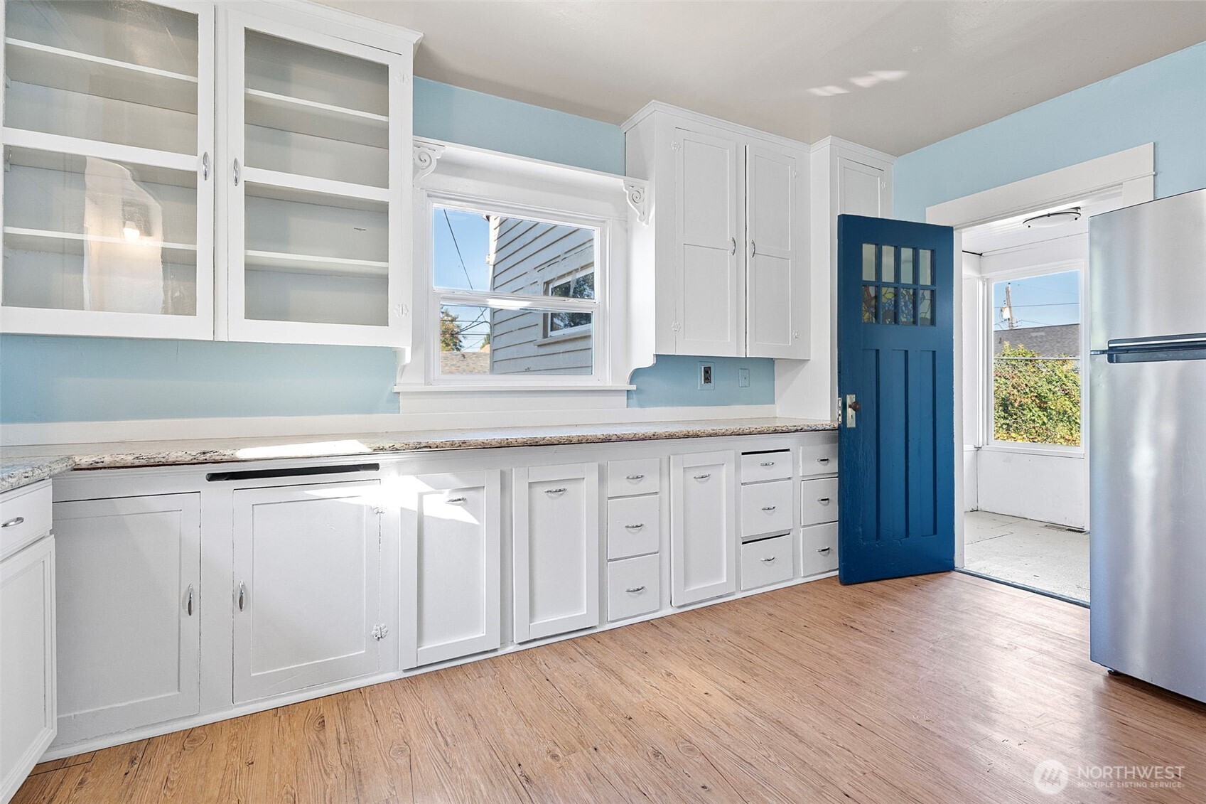 4512 South M Street Tacoma, WA 98418 - Photo 9 of 24 a kitchen with stainless steel appliances granite countertop a refrigerator and a sink