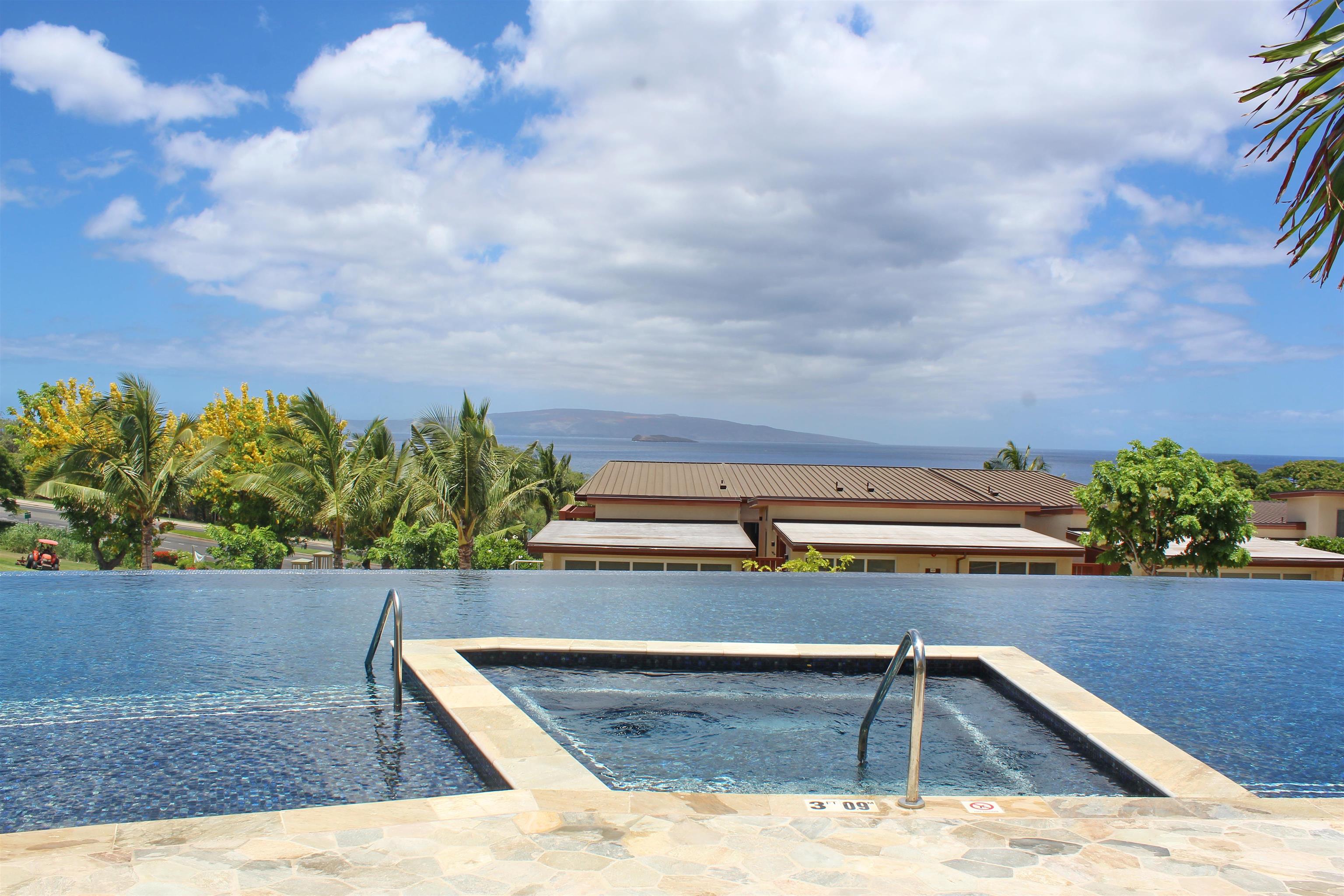 161 Holomoana Way, Unit 102 Kihei, HI 96753 - Photo 28 of 34 a view of swimming pool with outdoor seating