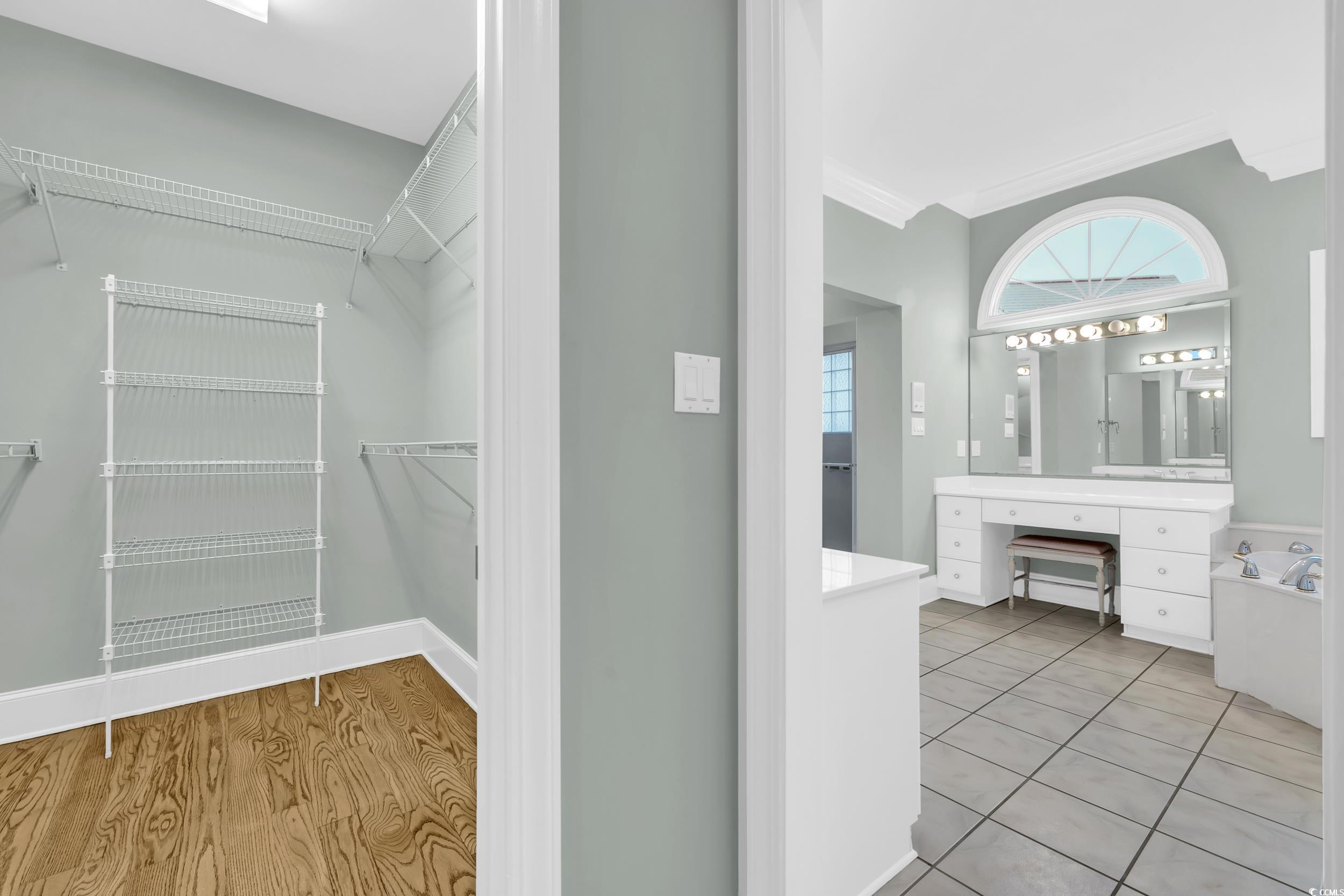 1473 Doar Point Myrtle Beach, SC 29577 - Photo 15 of 40 Walk in closet featuring light wood-type flooring