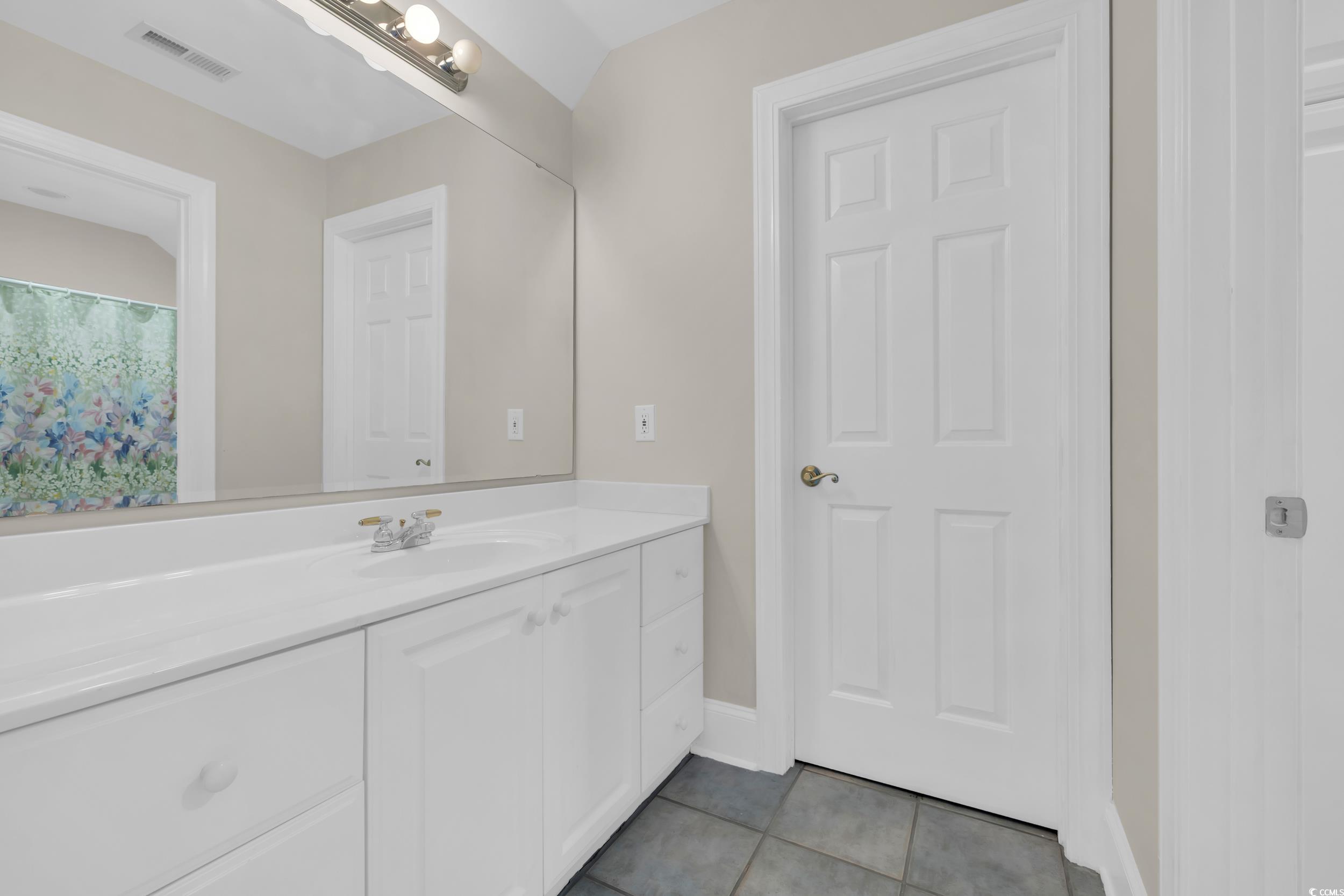 1473 Doar Point Myrtle Beach, SC 29577 - Photo 30 of 40 Bathroom featuring vanity and tile patterned floors
