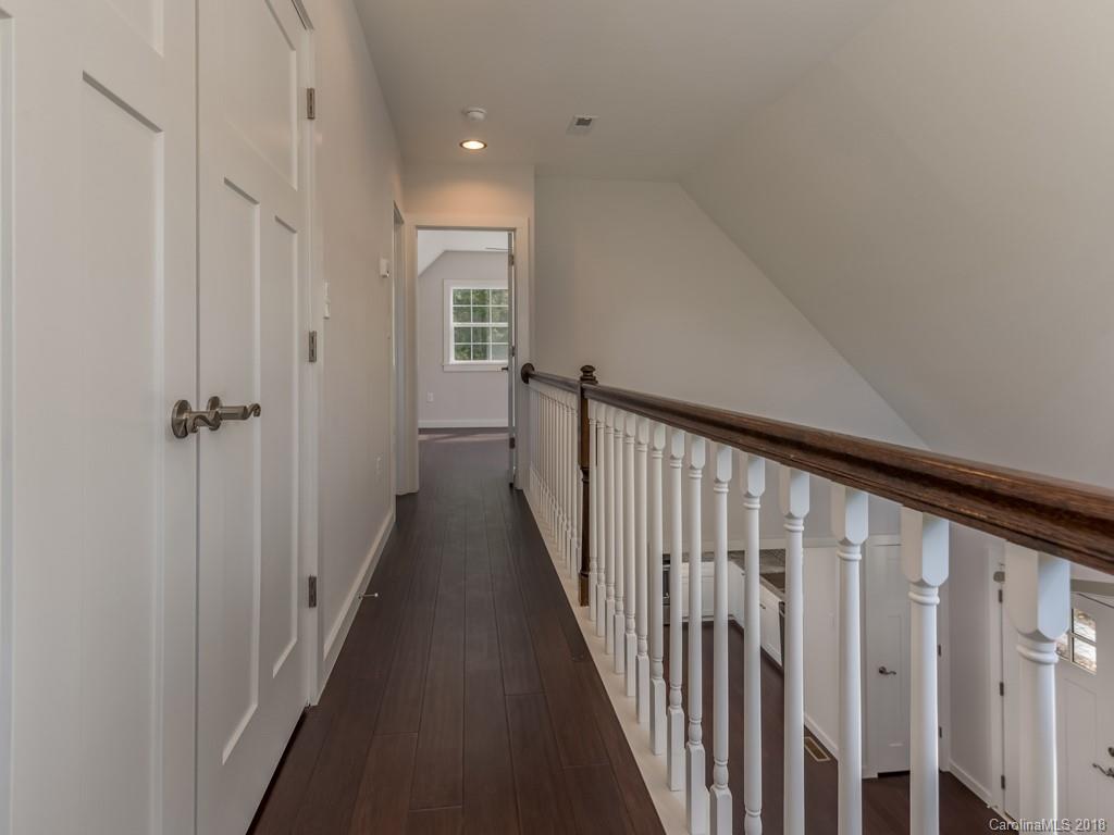 4924 Hudlow Road Union Mills, NC 28167 - Photo 14 of 34 a view of a hallway with a wooden door