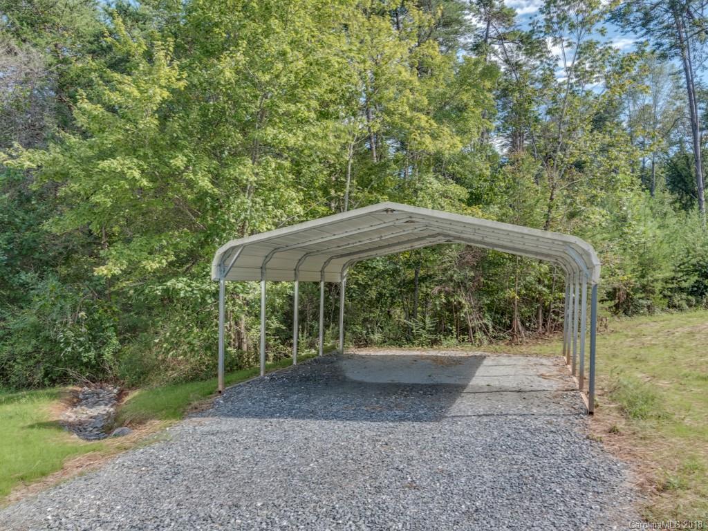4924 Hudlow Road Union Mills, NC 28167 - Photo 26 of 34 a view of a small yard and an tree