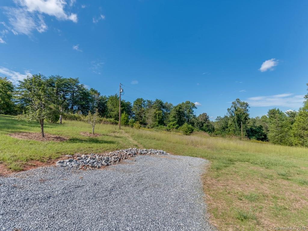 4924 Hudlow Road Union Mills, NC 28167 - Photo 27 of 34 a view of a field with trees in background