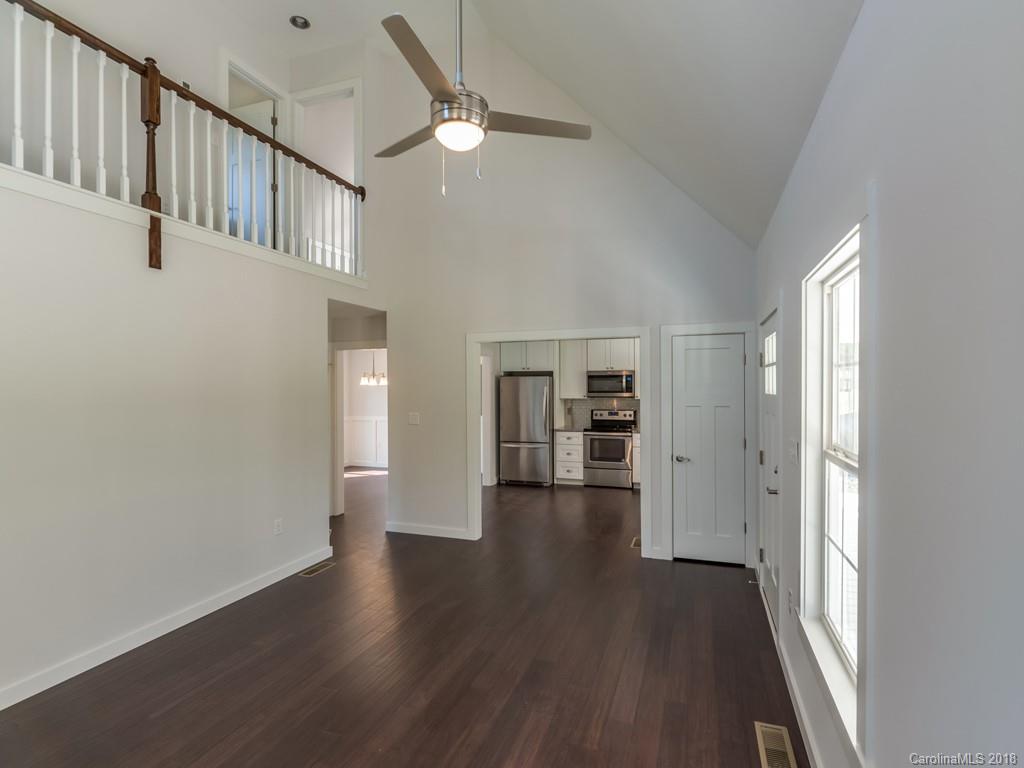 4924 Hudlow Road Union Mills, NC 28167 - Photo 6 of 34 wooden floor in an empty room with a window