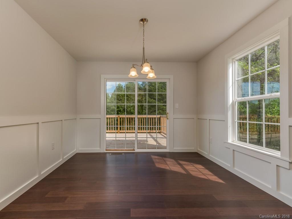 4924 Hudlow Road Union Mills, NC 28167 - Photo 9 of 34 a view of a room with wooden floor and windows