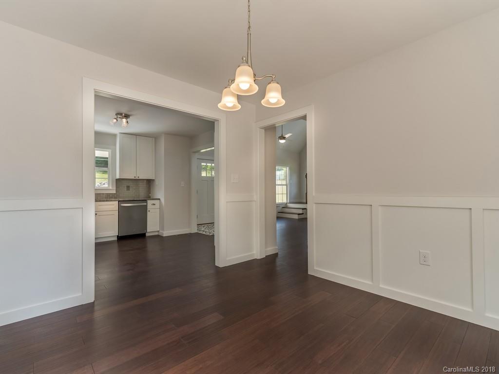 4924 Hudlow Road Union Mills, NC 28167 - Photo 10 of 34 a view of a kitchen with a dishwasher cabinets and wooden floor